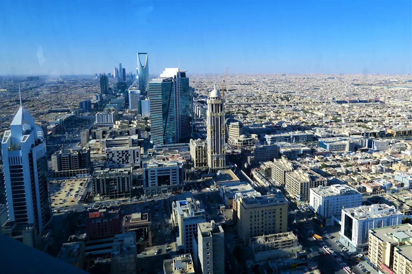 Riyadh skyline at dusk with modern skyscrapers and Kingdom Tower